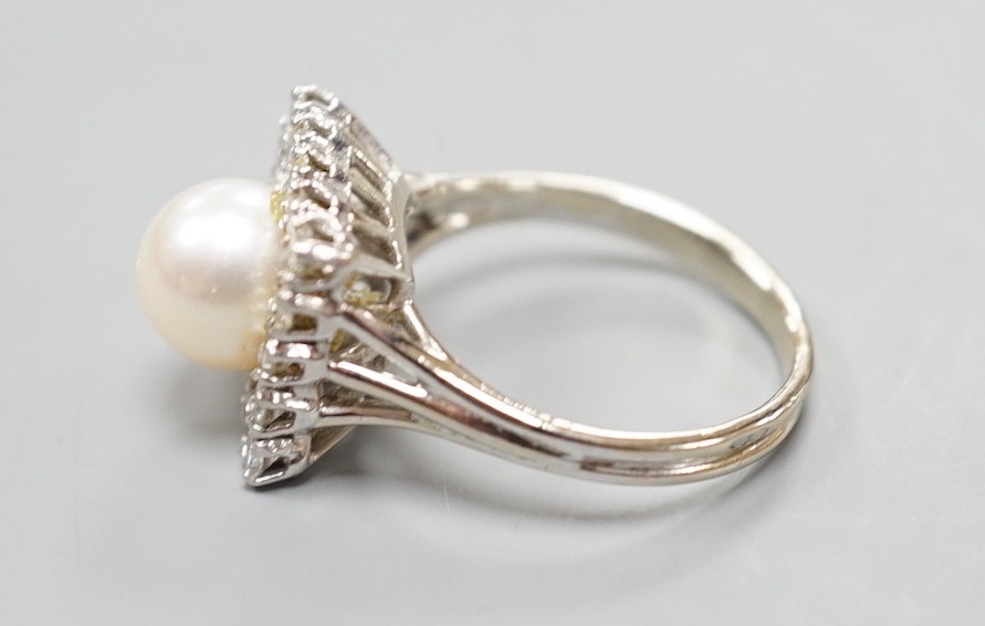 A white metal, cultured pearl and diamond set square cluster ring, size M, gross weight 5.5 grams.